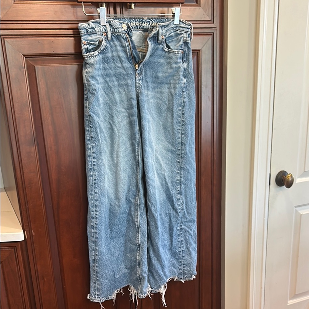American Eagle Outfitters Blue Flare Denim with Distressed Hem
